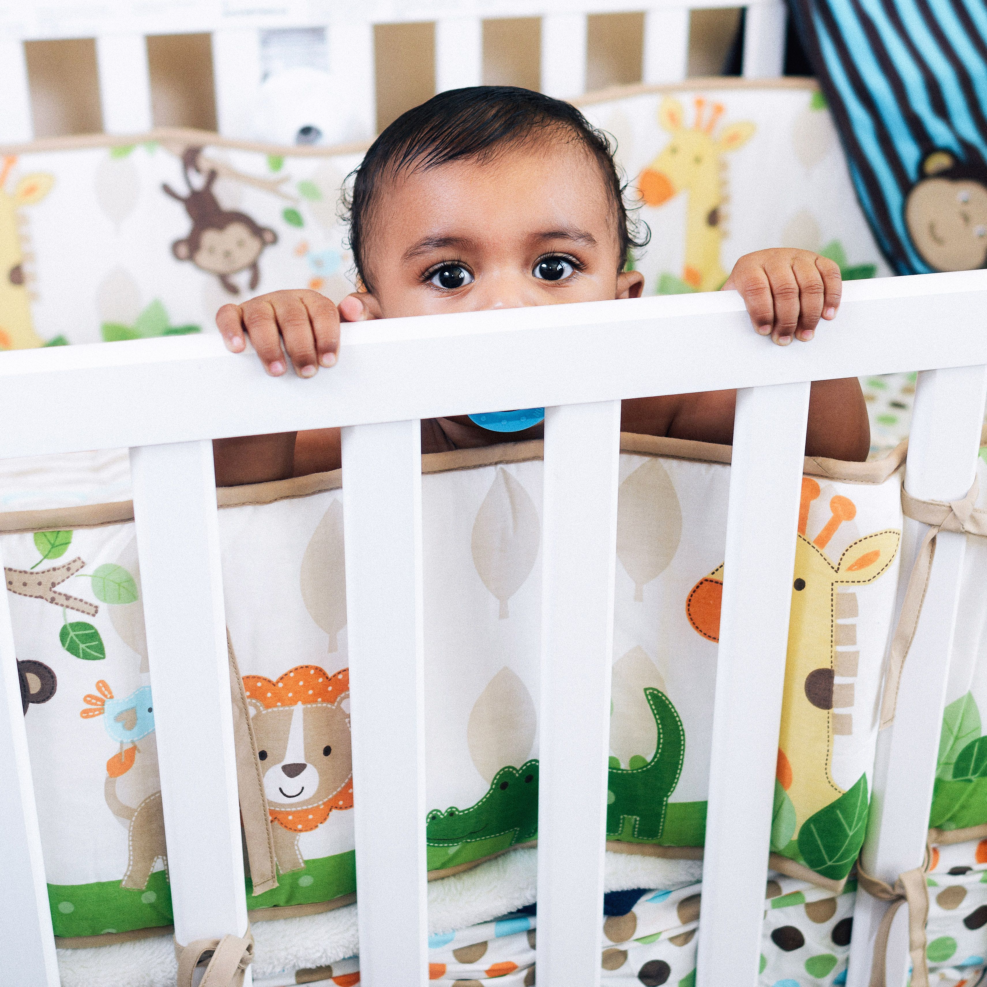 Plastic crib clearance rail teething guard